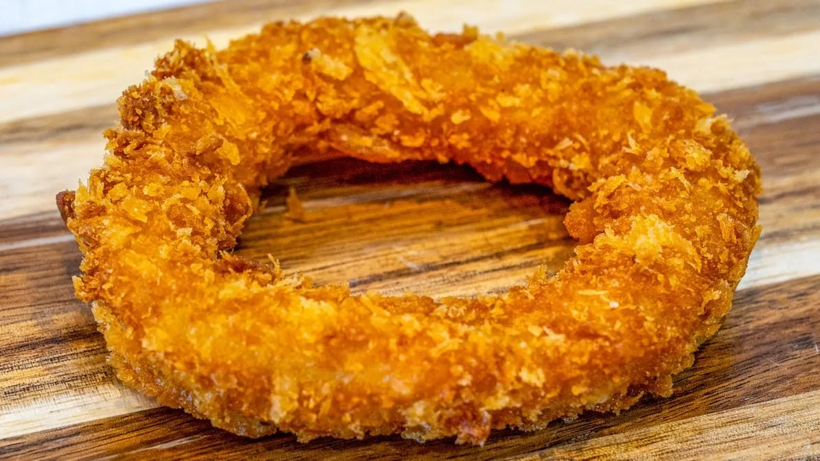 Close-up of golden battered fish with a crispy crust