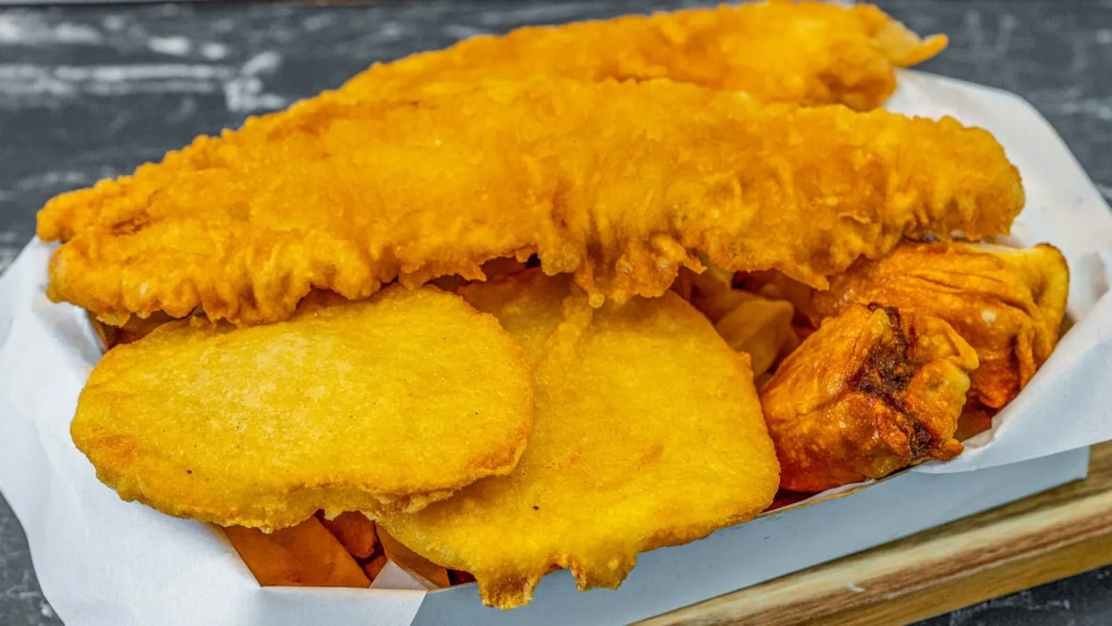 Chicken snitz burger on a board